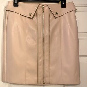 Guess Faux leather skirt with gold details.